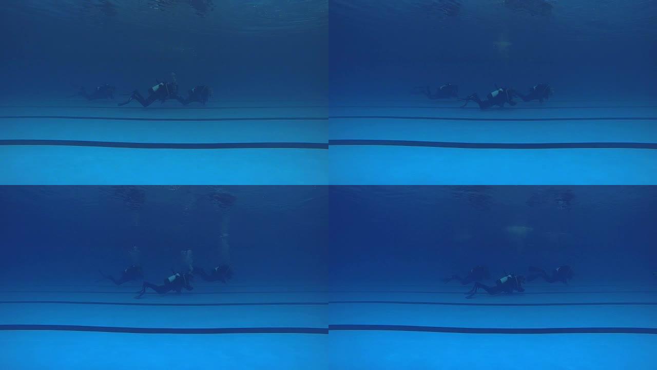 潜水员在游泳池里游泳