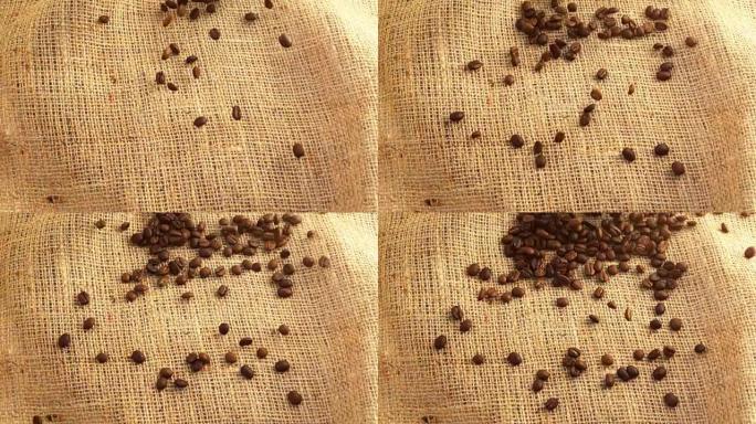 咖啡豆落在粗麻布上。慢动作。