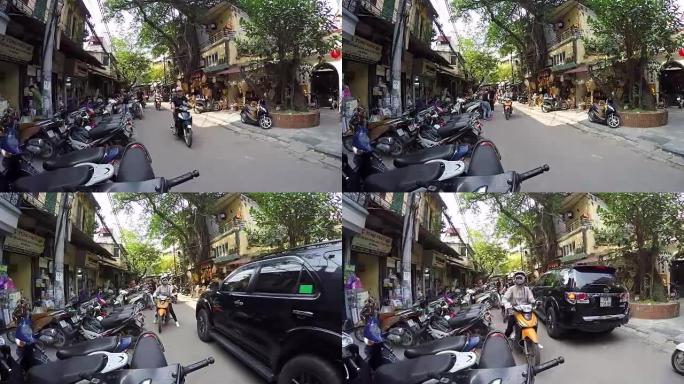 越南河内亚洲繁忙的街道上经过的摩托车和踏板车