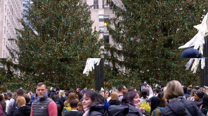 与大批游客一起关闭洛克菲勒中心圣诞树的详细视频