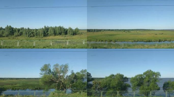 POV: 晴天，高速火车驶过低矮的森林，绿色的田野和湖泊