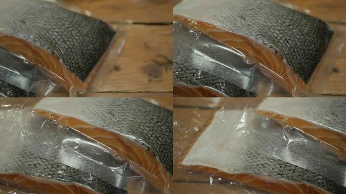 密封真空袋中的新鲜鲑鱼片包装。