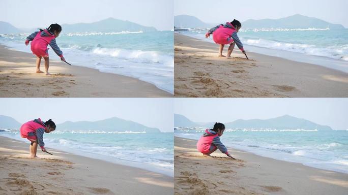 小女孩在海滩上玩海浪