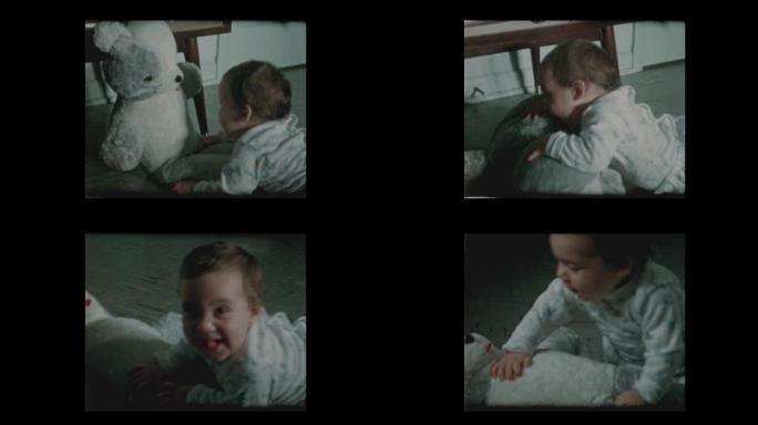 1960快乐的男婴喜欢和玩毛绒玩具熊