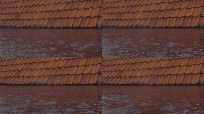 雨水落在欧洲的红色屋顶瓦片上