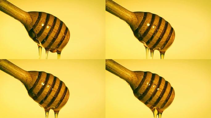 Close up a pouring golden sweet honey dripping  on