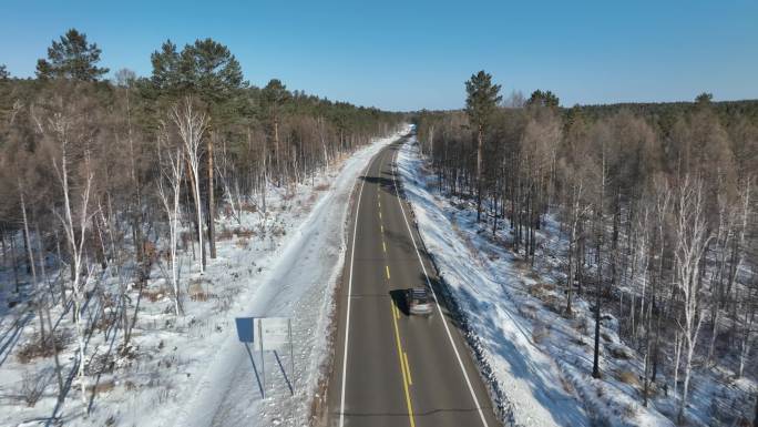 原创 黑龙江大兴安岭雪原森林公路航拍景观