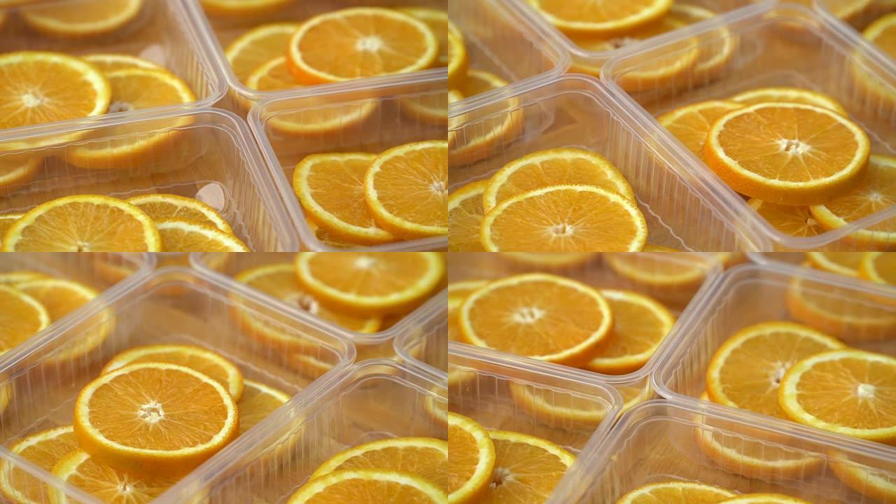 旋转新鲜的柑橘子水果。无缝循环旋转切片橙子