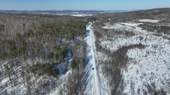 原创 黑龙江大兴安岭雪原森林公路航拍景观