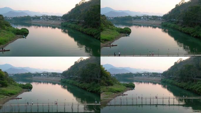 日落时湄公河大桥宁静景象的鸟瞰图