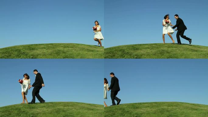 新娘和新郎在草山上奔跑