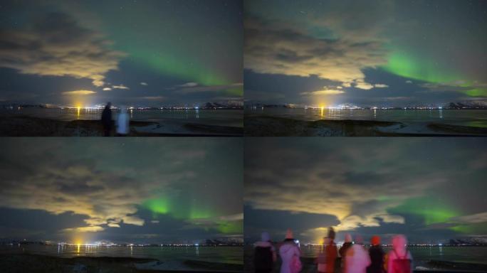 观看冰岛雷克雅未克附近北极光的游客的延时