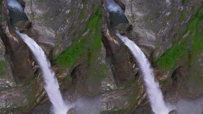 尼泊尔强大的瀑布的垂直无人机拍摄