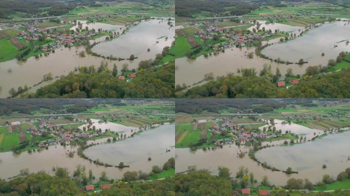 空中: 河水溢出河岸后，河水上升到村庄