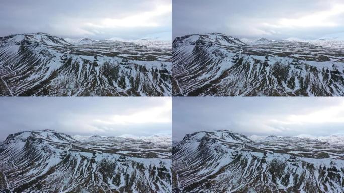 在大雾天，冰岛北部国家公园的一座山和海滩上的4k航拍画面。