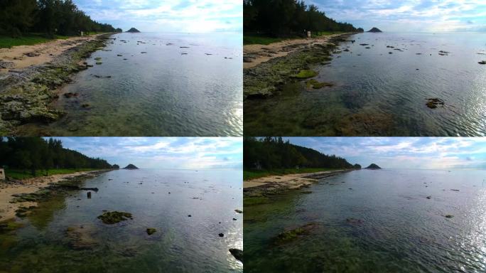 三亚原生态海岛航拍清澈的海水与潮间带