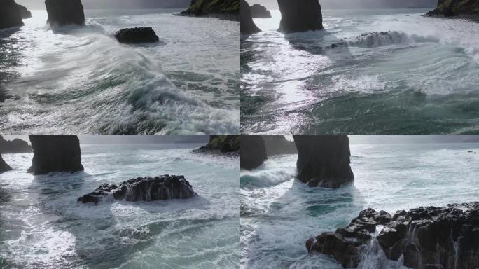 Ribeira da Janela海滩岩石上方4k的绝佳航拍画面。海浪猛烈冲击，水流过悬崖。