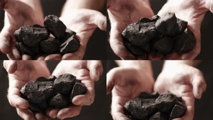 矿工手中的煤。他手中的煤。矿工手中的煤。