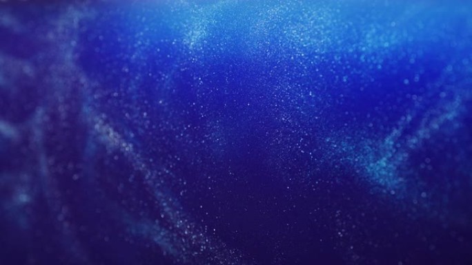 像深海背景一样漂浮的蓝色闪光颗粒