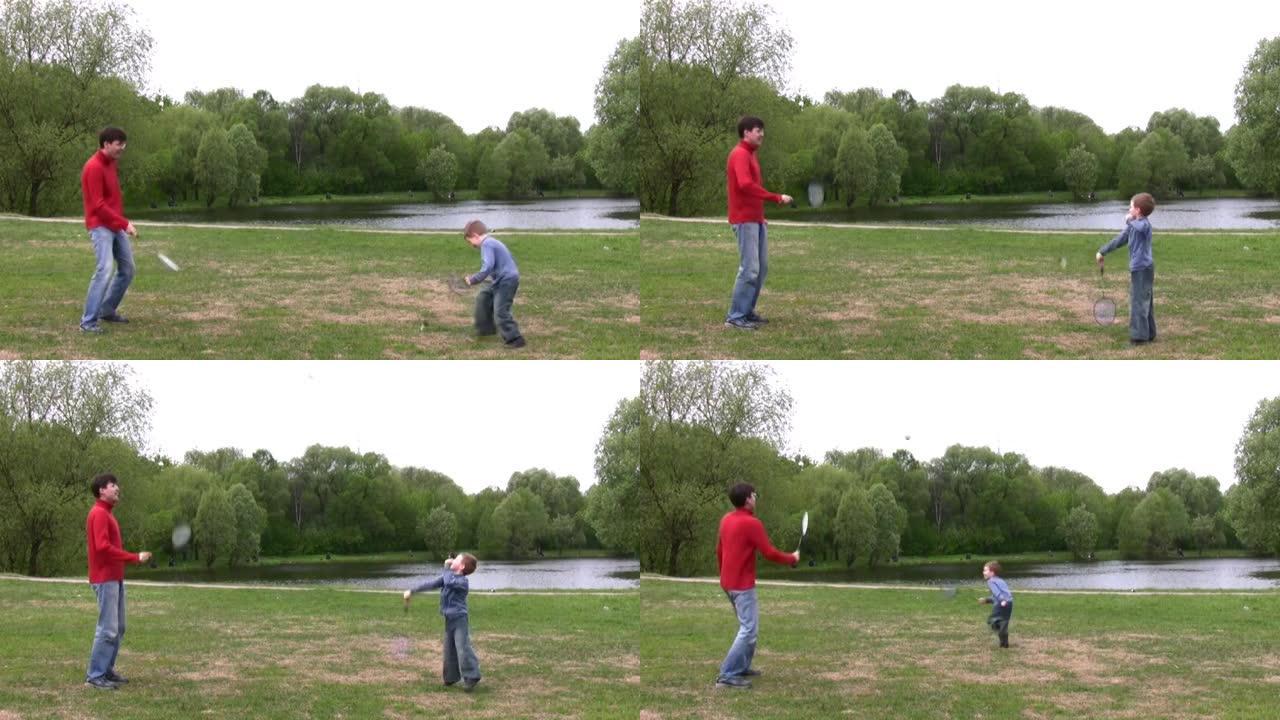 父亲与儿子打羽毛球