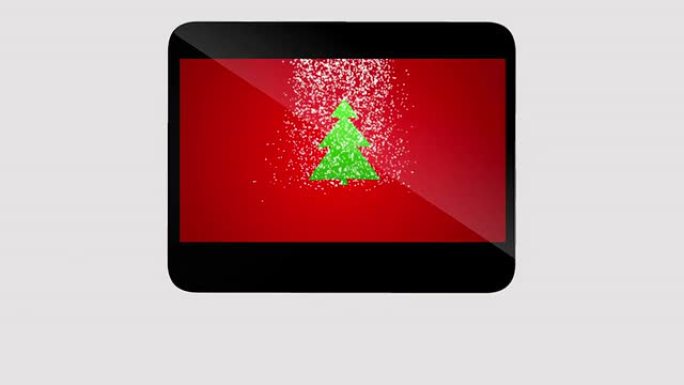 平板电脑上的绿色圣诞树。文本的位置。阿尔法
