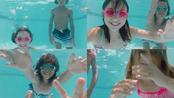 快乐的孩子在游泳池水下游泳微笑挥动双手孩子们享受暑假一起漂浮在清澈的水中