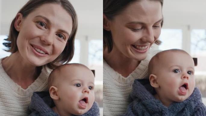 快乐的妈妈和宝宝使用智能手机进行视频聊天妈妈分享母亲的生活方式抱着蹒跚学步的孩子在垂直屏幕pov上与