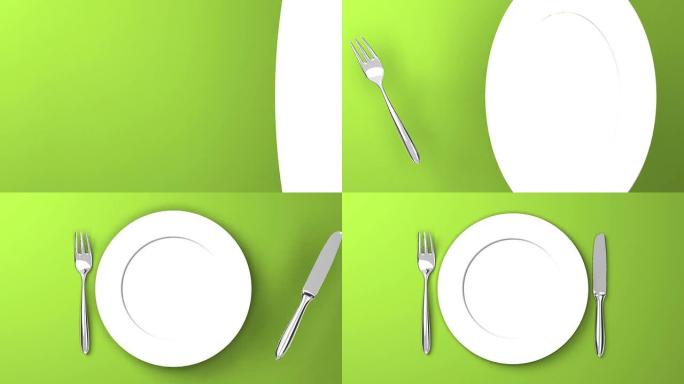 绿色背景上餐具和盘子的俯视图