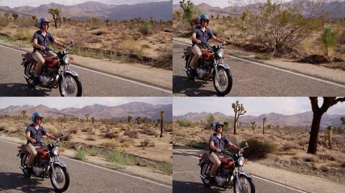 男子在沙漠中驾驶摩托车