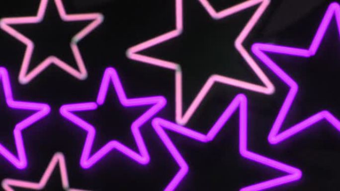 紫色和粉红色的霓虹灯星星。