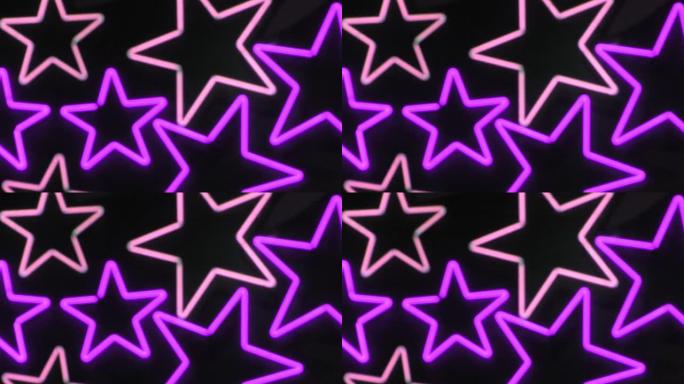 紫色和粉红色的霓虹灯星星。