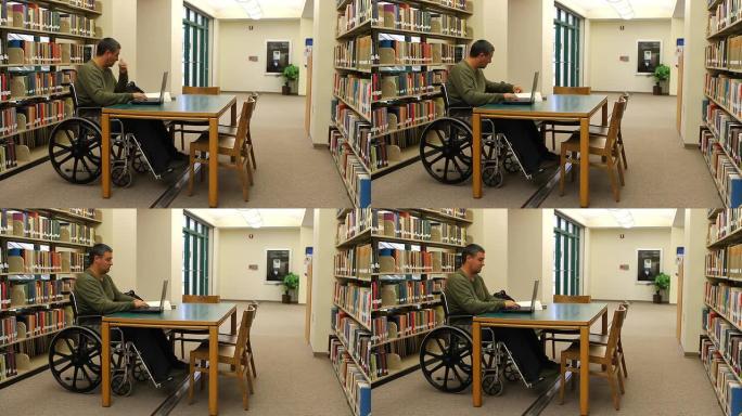轮椅笔记本电脑图书馆