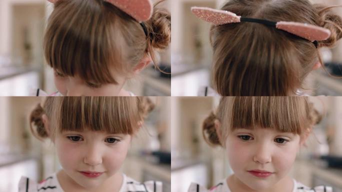 肖像美丽的小女孩戴着猫耳朵微笑着可爱的表情