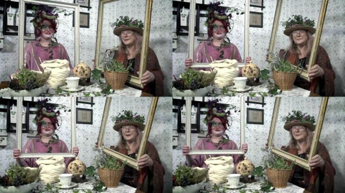 高清-慢: 戴着帽子和植物的女士拿着空相框