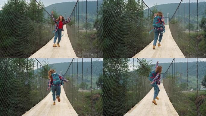 快乐游客跑山河大桥。兴奋的女孩跳上大自然。