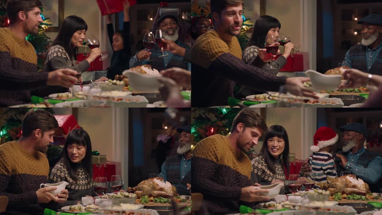 幸福的夫妇和朋友一起享受圣诞晚餐，庆祝节日，家人在家共享晚餐4k