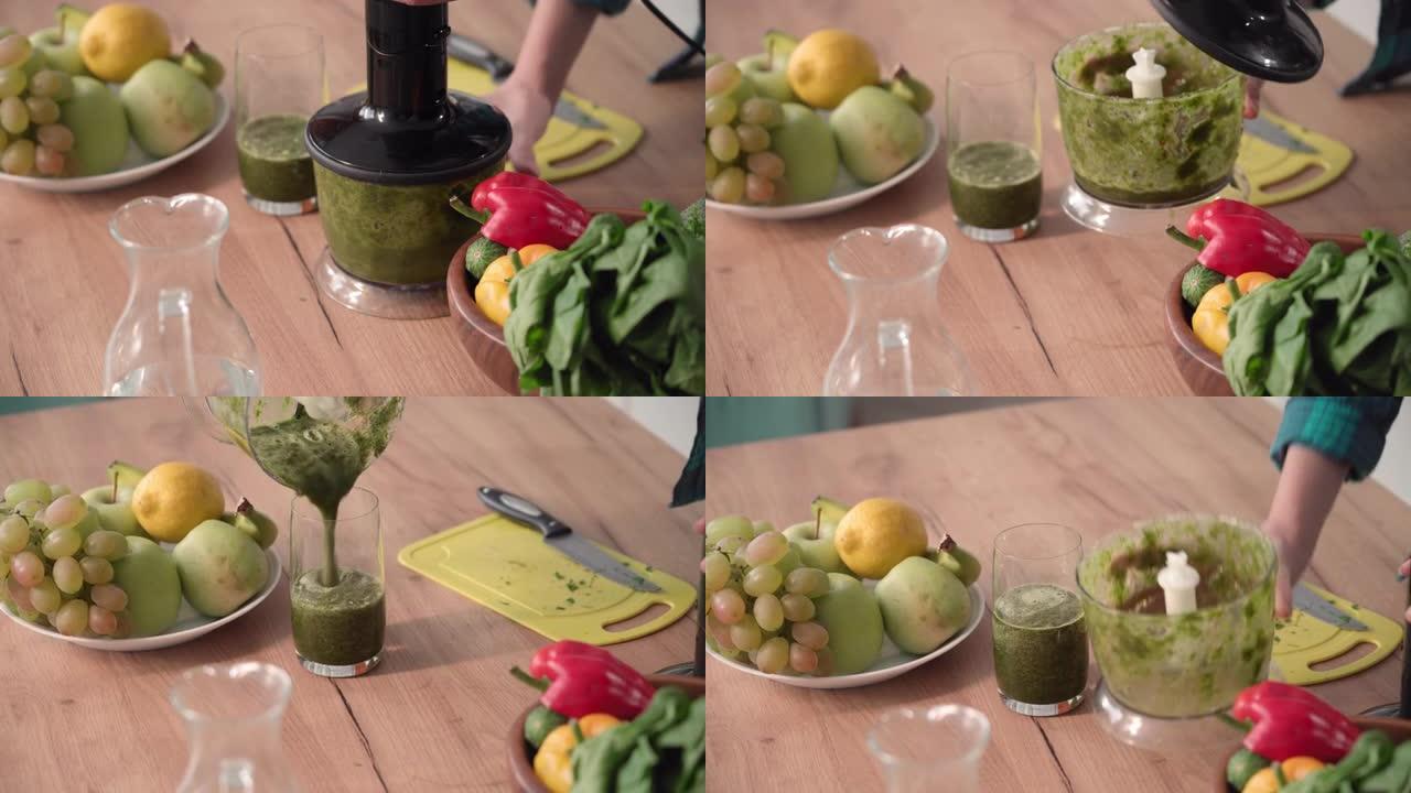 绿色冰沙制备过程，蔬菜在电动浸入式搅拌机中切碎，特写