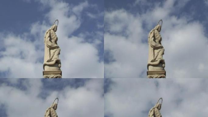 天使雕像上的云。时间。(侧视图)