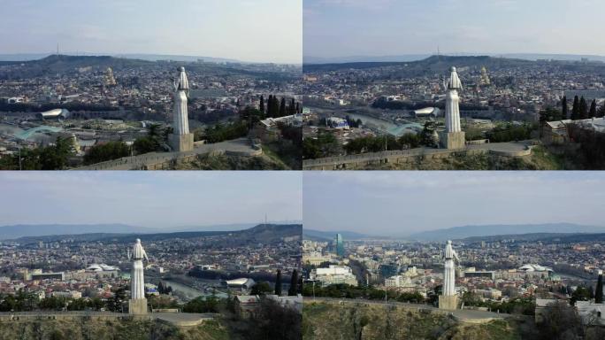 从乔治亚母亲雕像后面的第比利斯大城市鸟瞰图，4k