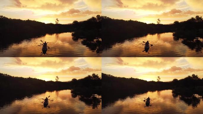 日落时在反射河上划船
