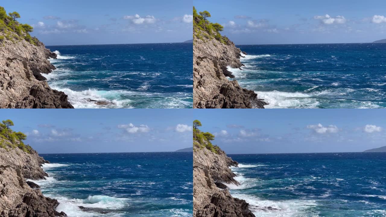 Cephalonia希腊岛岩石海岸慢动作离子海浪景观4k镜头。大自然中的美与旅行理念。