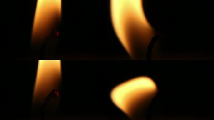 蜡烛上的宏观火焰显示燃烧的灯芯蜡烛