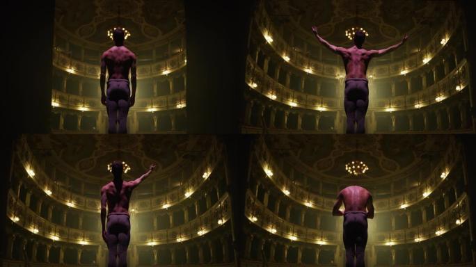 年轻的古典芭蕾舞男舞者站在经典剧院舞台上的电影背景图，聚光灯下进行谢幕。运动表演者鞠躬并接受观众的掌