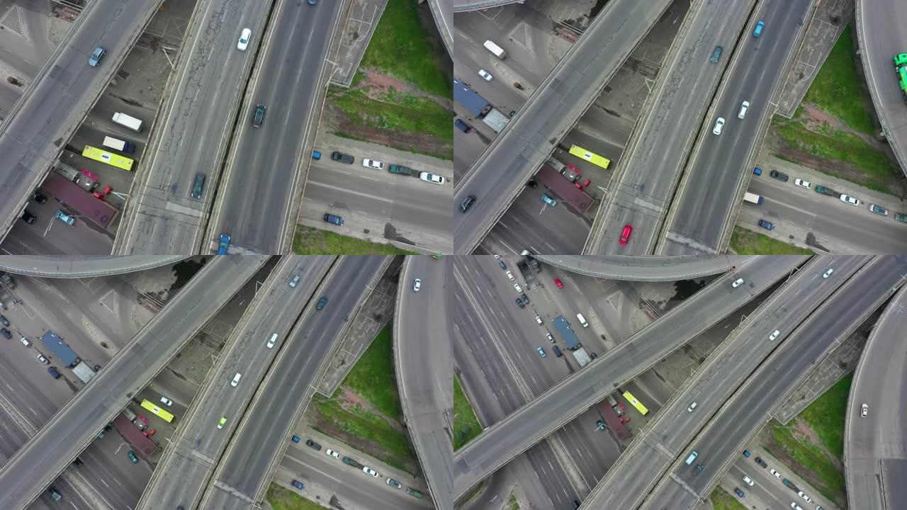 维杜比奇地铁站基辅带桥梁的交通枢纽鸟瞰图。城市中的汽车交通。