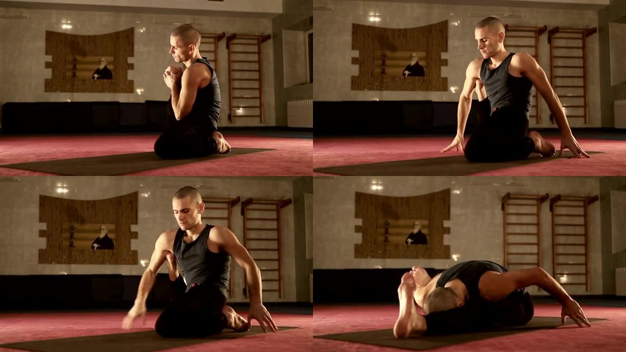 瑜伽教练在运动健身房中展示腿部灵活的锻炼