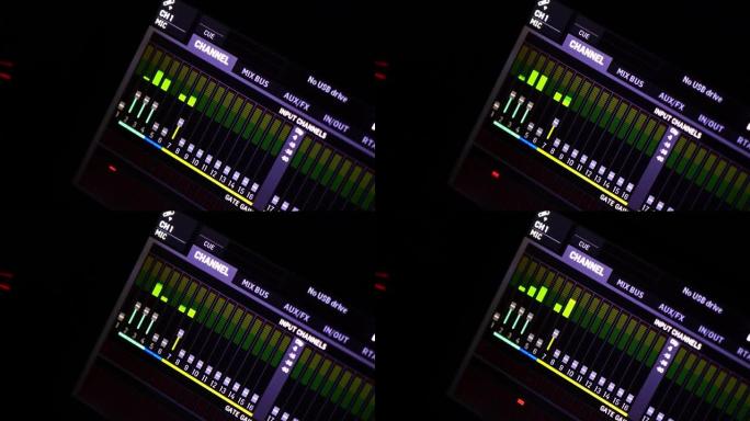 在无线电演播室的电子调音台控制台上按频道显示带有音频信号电平指示器的数字均衡器。DJ工程师调节现场声