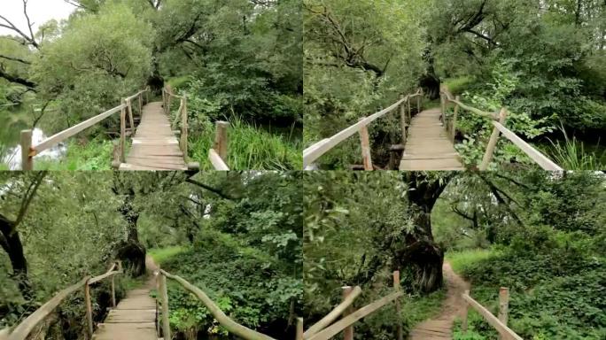 摄像机飞过长长的木桥。Steadycam镜头