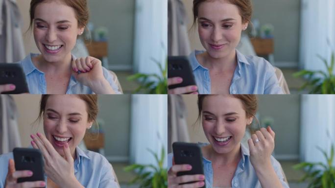 美丽的女人用智能手机视频聊天炫耀结婚戒指分享激动人心的订婚享受在线交流在家