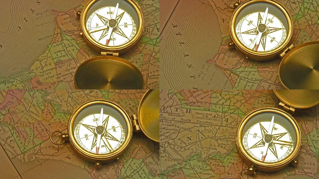 古董地图上的旧黄铜指南针