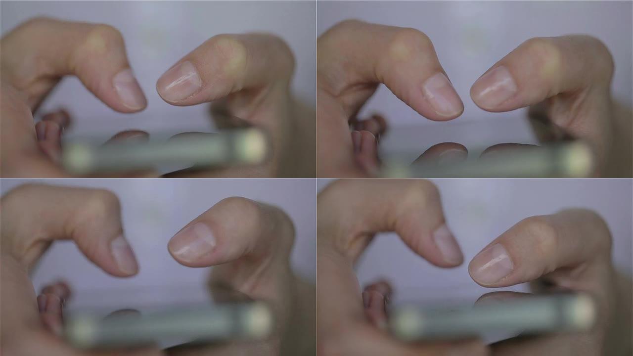 女人白色连衣裙手指在智能手机上打字